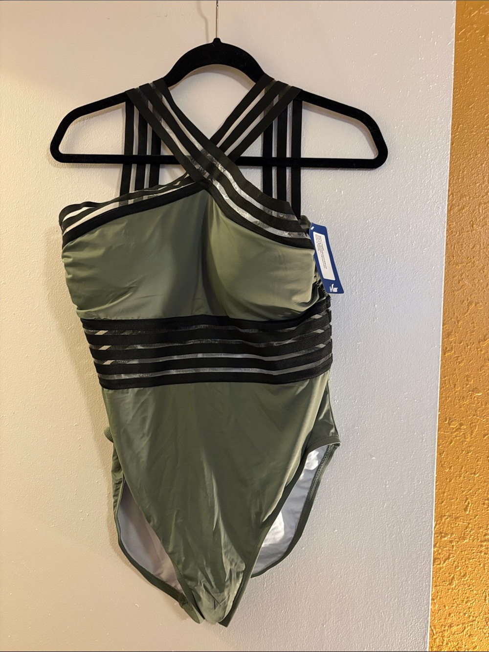 NWT green one piece swimsuit with mesh details